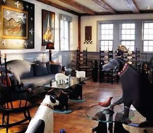 Stephen & Gwen Huneck's living room filled with handmade furniture and dog art