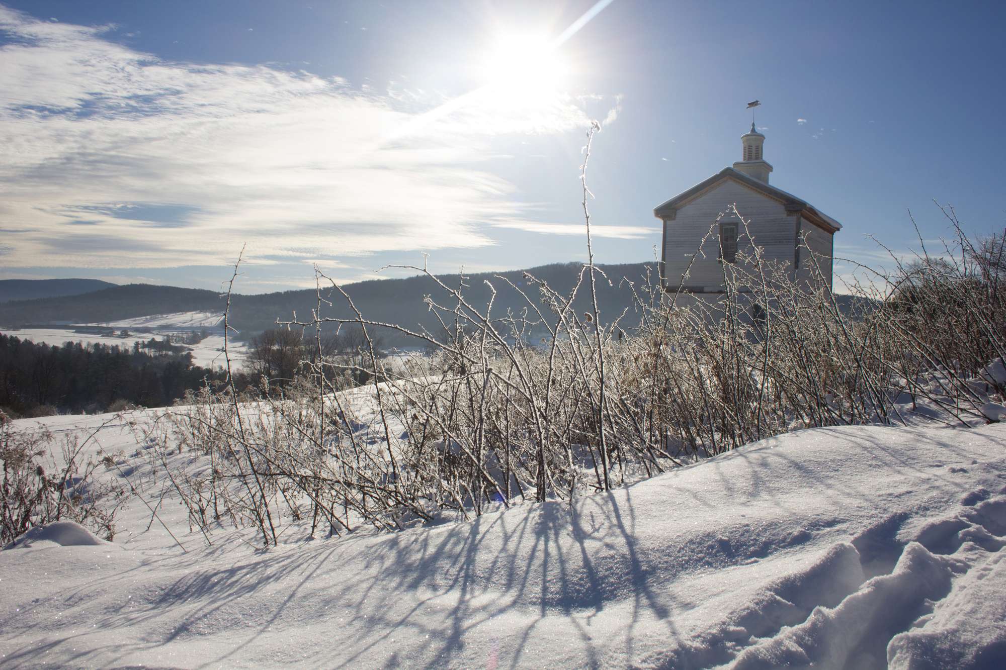 Snowy winter landscape with Dog Chapel