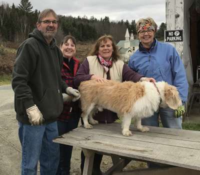 volunteers with dog