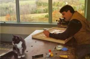 Stephen Carving with his cat, Bingo