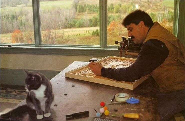 Stephen Carving with his cat, Bingo